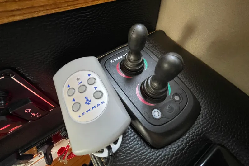 Motivated Yacht Photos Pics Lewmar control panel and joysticks in 2022 Cutwater C-32 CB boat interior.