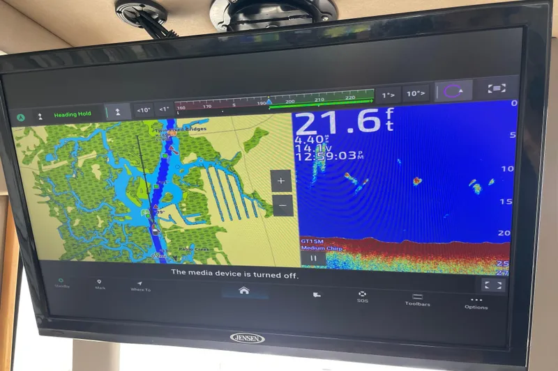 Motivated Yacht Photos Pics Navigation and sonar display on 2022 Cutwater C-32 CB boat, showing depth and map.