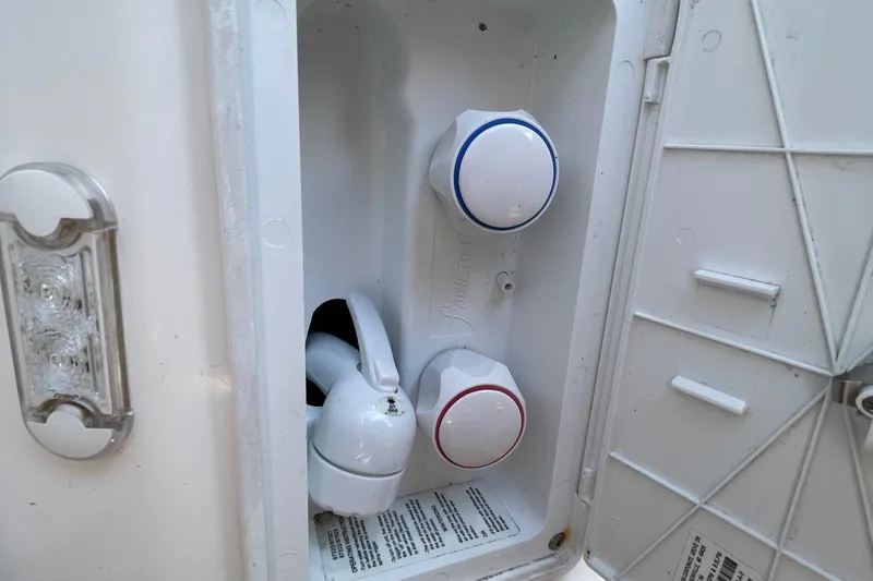 Motivated Yacht Photos Pics Exterior shower controls on a 2022 Cutwater C-32 CB boat.
