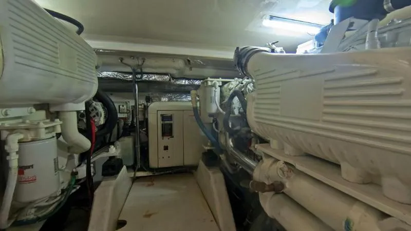  Yacht Photos Pics Engine room of 2005 Tiara Yachts 3600 Sovran, showcasing mechanical components and equipment.
