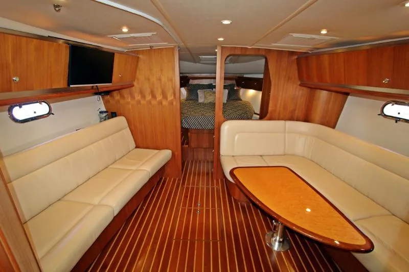  Yacht Photos Pics Luxurious interior of 2005 Tiara Yachts 3600 Sovran with elegant wood and leather seating.