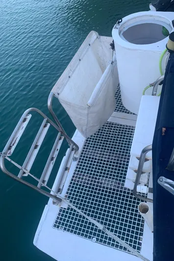  Yacht Photos Pics 2005 Tiara Yachts 3600 Sovran swim platform with ladder and storage compartments.