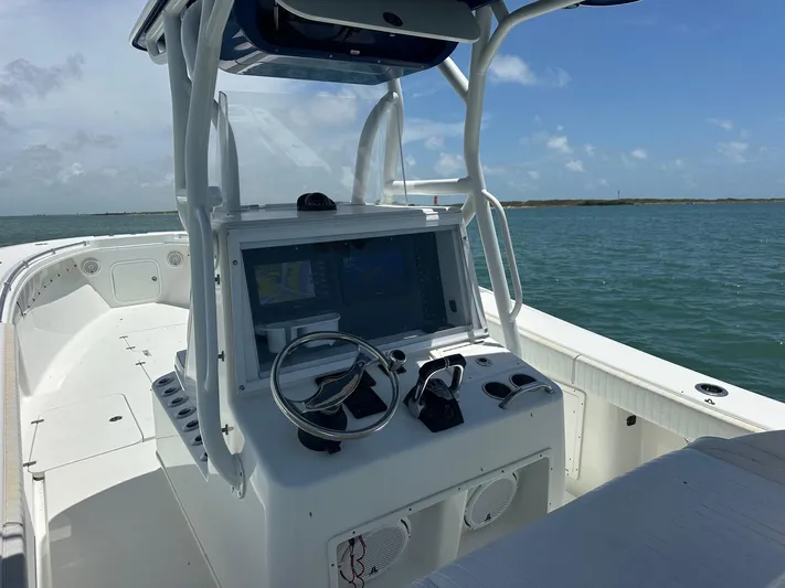  Yacht Photos Pics 2012 Yellowfin 36 Offshore boat dashboard with ocean view.