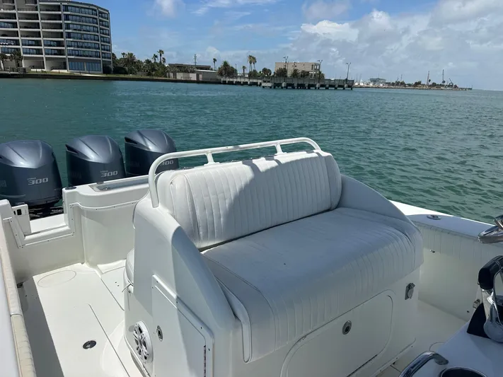  Yacht Photos Pics 2012 Yellowfin 36 Offshore boat with triple Yamaha 300 engines on calm water.