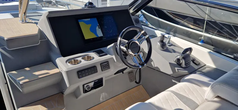  Yacht Photos Pics Helm of 2024 Windy 40 Camira RS yacht with modern navigation system and controls.