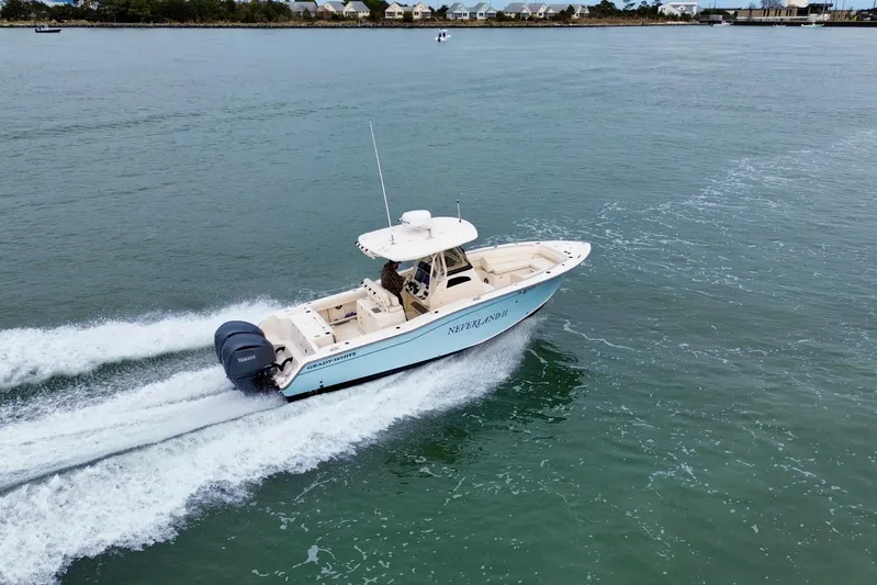 Neverland II Yacht Photos Pics 2022 Grady-White Canyon 271 boat cruising on open water.