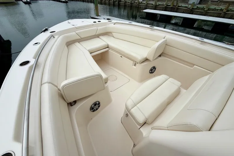 Neverland II Yacht Photos Pics 2022 Grady-White Canyon 271 boat interior with luxurious seating and sleek design.