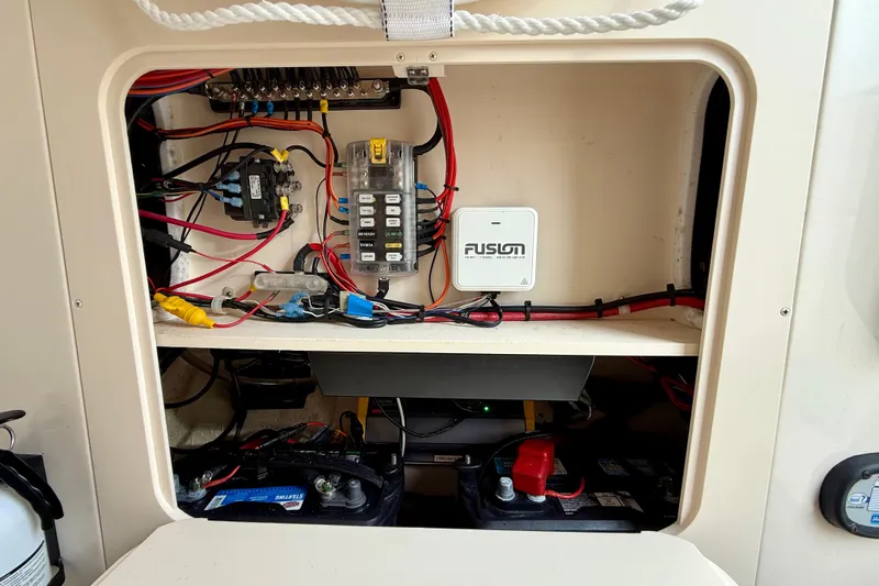 Neverland II Yacht Photos Pics Electrical panel and battery compartment of 2022 Grady-White Canyon 271 boat.