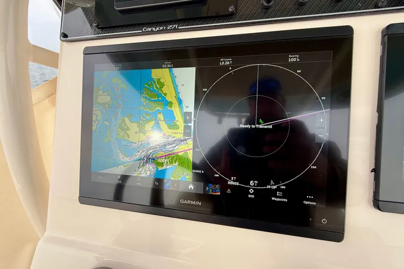Neverland II Yacht Photos Pics Garmin navigation display on 2022 Grady-White Canyon 271 boat dashboard.
