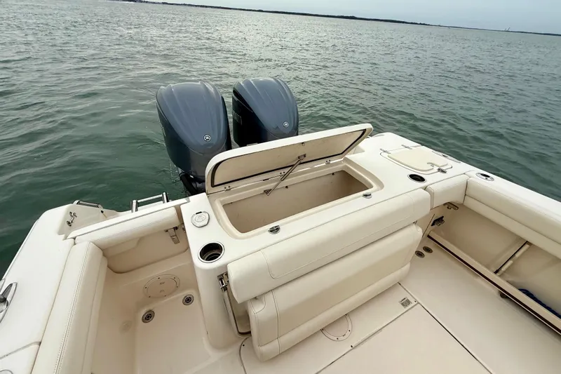 Neverland II Yacht Photos Pics 2022 Grady-White Canyon 271 boat with dual engines on calm water.