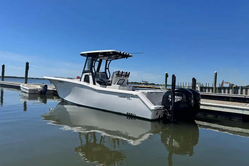  Yacht Photos Pics 2022 Tidewater 280 CC Adventure boat docked with twin Yamaha engines.
