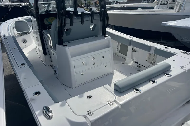  Yacht Photos Pics 2026 Sportsman Open 302 Center Console boat interior with seating and storage compartments.