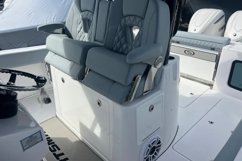  Yacht Photos Pics 2026 Sportsman Open 302 Center Console with luxurious seating and modern design.