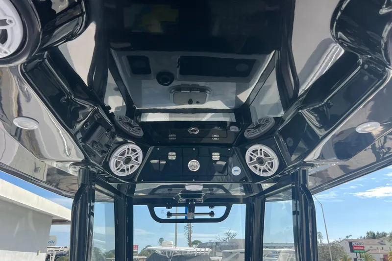  Yacht Photos Pics 2026 Sportsman Open 302 Center Console interior with speakers and control panel.