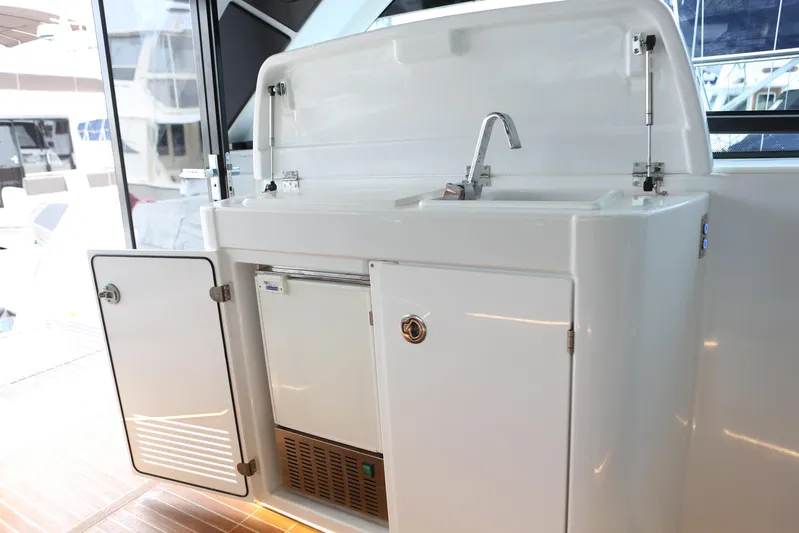 Lucky Lovers Yacht Photos Pics Fridge, sink, countertop in salon