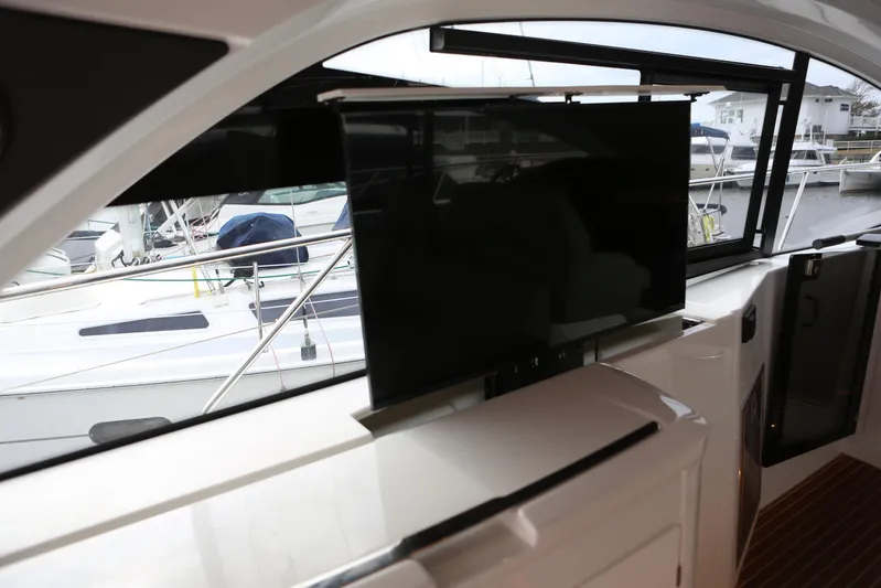 Lucky Lovers Yacht Photos Pics TV in salon hides away