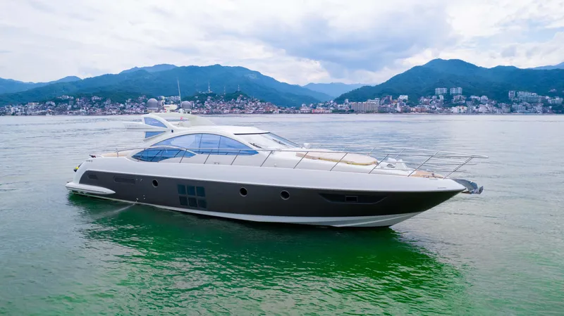 Bala Yacht Photos Pics 2009 Azimut 62S yacht on calm waters with mountain backdrop.