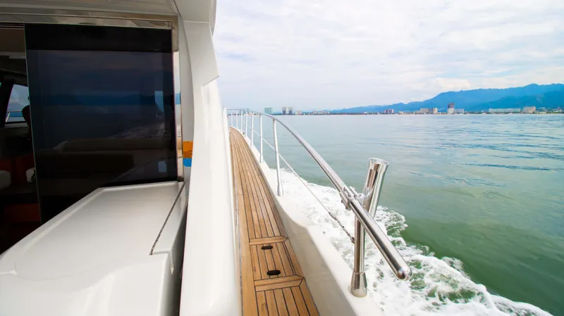 Bala Yacht Photos Pics 2009 Azimut 62S yacht cruising on calm waters.