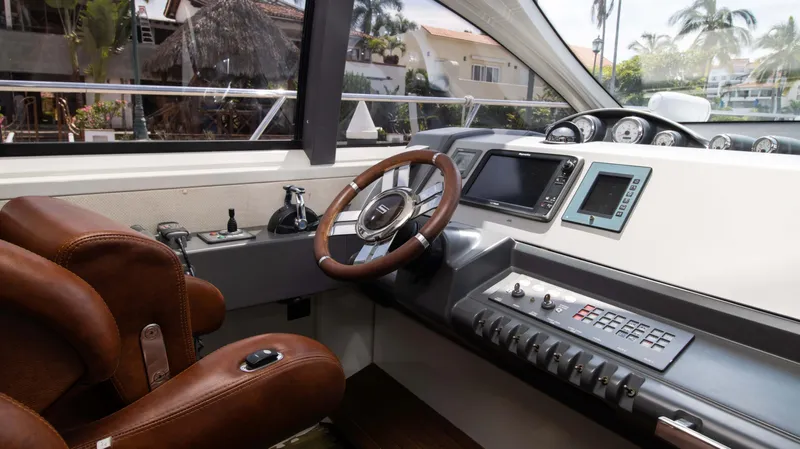 Bala Yacht Photos Pics Interior of 2009 Azimut 62S yacht with steering wheel and instruments.