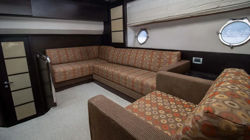 Bala Yacht Photos Pics Interior of 2009 Azimut 62S yacht with stylish upholstered seating.