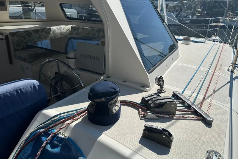 Makani Yacht Photos Pics 2008 Seawind 1000 XL sailboat deck with ropes, winch, and Garmin navigation system.