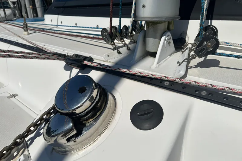 Makani Yacht Photos Pics Close-up of 2008 Seawind 1000 XL sailboat deck with winch and rigging.
