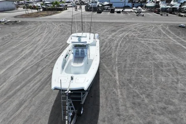  Yacht Photos Pics Aerial view of 2022 Freeman 37 VH boat on dry land, ready for transport.
