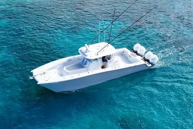  Yacht Photos Pics Aerial view of 2022 Freeman 37 VH boat on clear blue water.