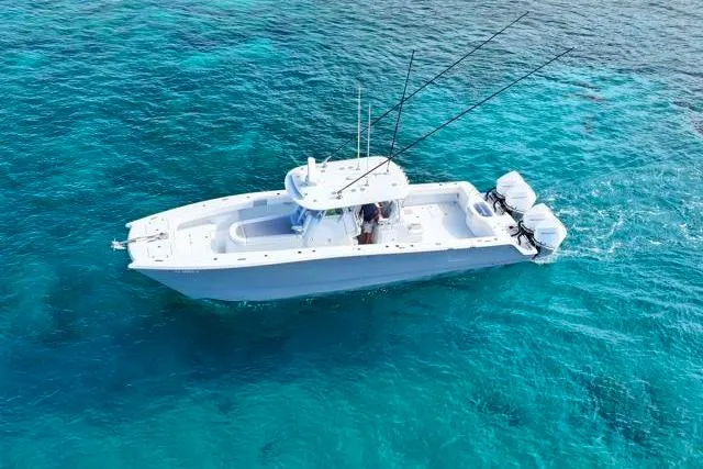  Yacht Photos Pics Aerial view of 2022 Freeman 37 VH boat on clear blue water.