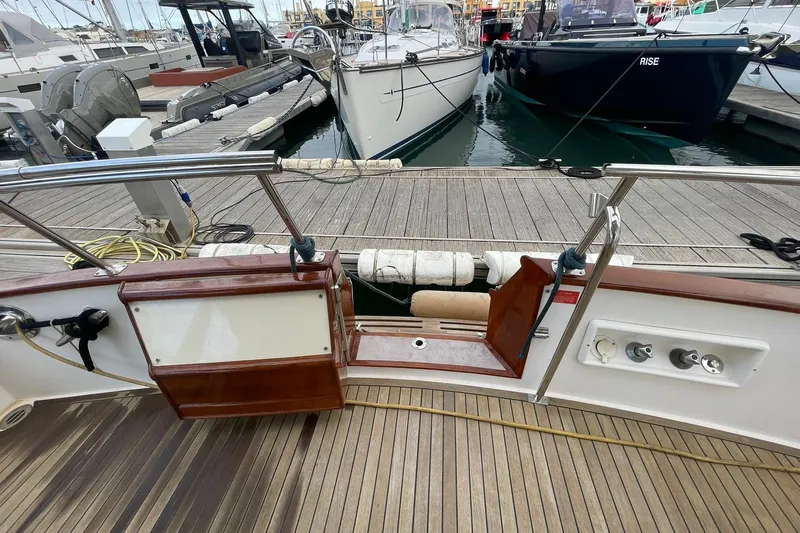 Peponi II Yacht Photos Pics 2008 Grand Banks 47 Heritage EU yacht docked, showcasing teak deck and open transom gate.