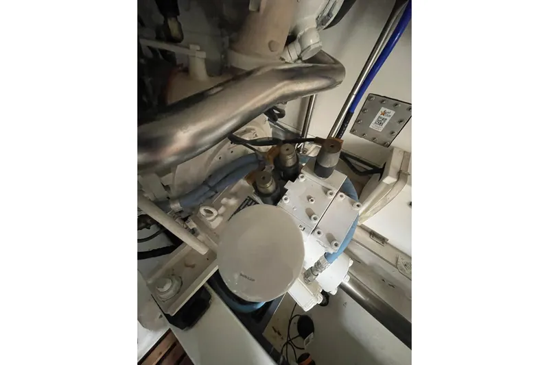 Peponi II Yacht Photos Pics Engine room of 2008 Grand Banks 47 Heritage EU, showcasing mechanical components and piping.