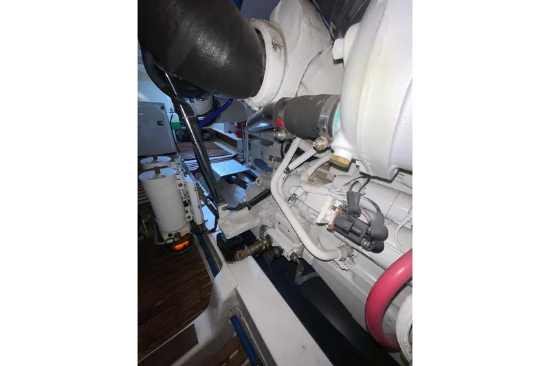 Peponi II Yacht Photos Pics Engine room of 2008 Grand Banks 47 Heritage EU yacht, showcasing mechanical components.