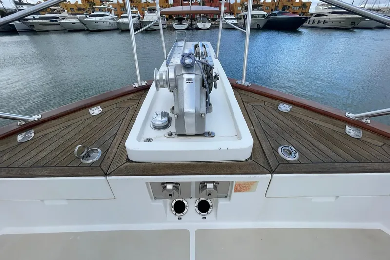 Peponi II Yacht Photos Pics Bow view of 2008 Grand Banks 47 Heritage EU yacht in marina setting.