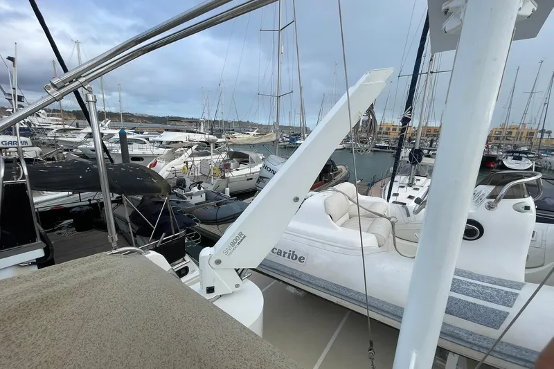 Peponi II Yacht Photos Pics 2008 Grand Banks 47 Heritage EU yacht docked in a busy marina with other boats.