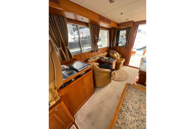 Peponi II Yacht Photos Pics Luxurious interior of 2008 Grand Banks 47 Heritage EU yacht with elegant wood finishes.