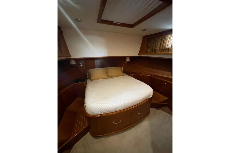 Peponi II Yacht Photos Pics Luxurious cabin interior of 2008 Grand Banks 47 Heritage EU yacht with cozy bed.