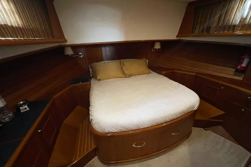Peponi II Yacht Photos Pics Cozy cabin interior of 2008 Grand Banks 47 Heritage EU yacht with wooden finish.