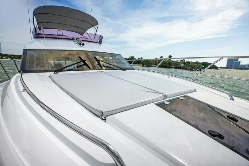 Zefa Yacht Photos Pics 2019 Princess 43 Flybridge yacht on water, showcasing sleek design and spacious deck.