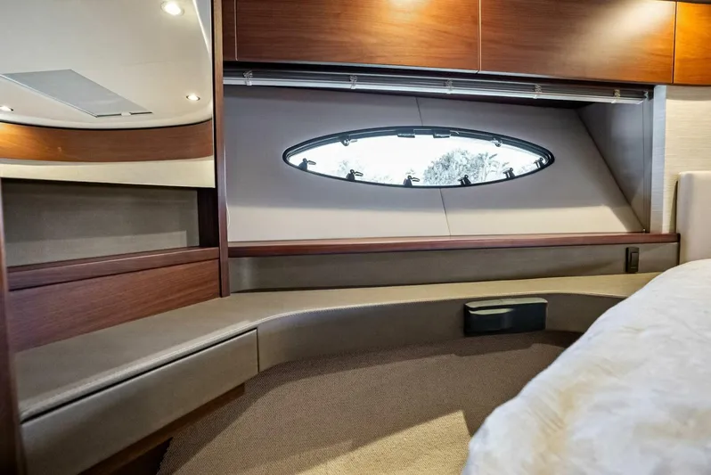 Zefa Yacht Photos Pics Luxurious interior of 2019 Princess 43 Flybridge yacht with elegant wood finish.