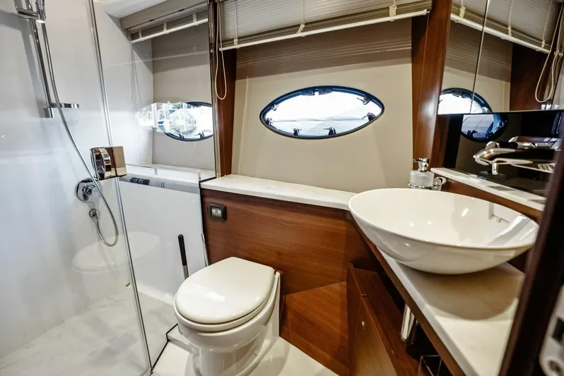 Zefa Yacht Photos Pics Luxurious bathroom in 2019 Princess 43 Flybridge yacht with modern fixtures and elegant design.
