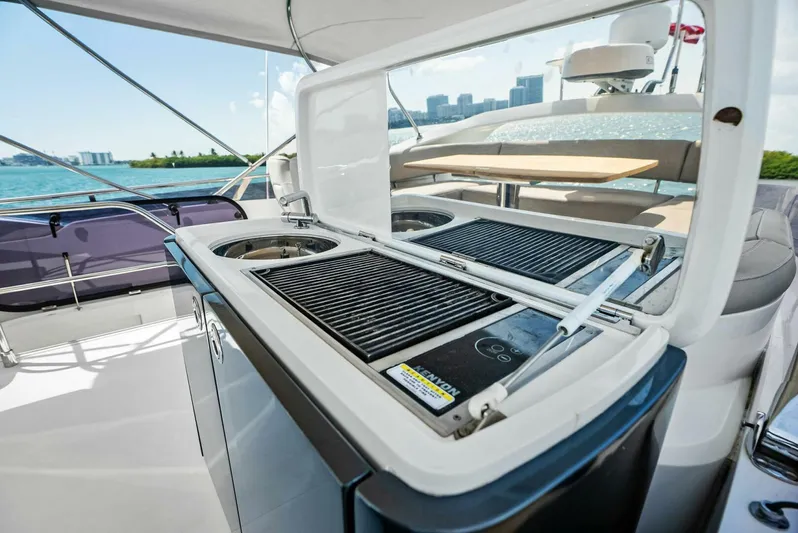 Zefa Yacht Photos Pics Outdoor kitchen on 2019 Princess 43 Flybridge yacht with grill and sink.