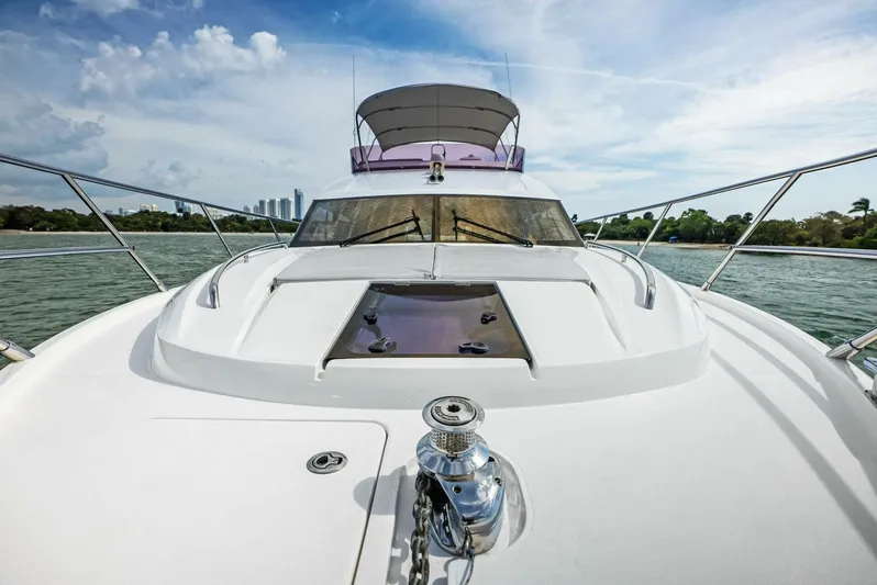 Zefa Yacht Photos Pics 2019 Princess 43 Flybridge yacht on water, showcasing sleek design and luxury features.