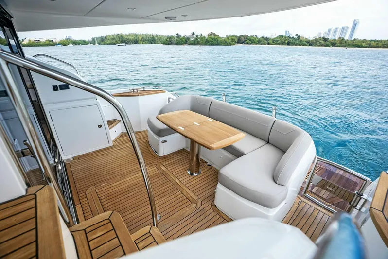 Zefa Yacht Photos Pics Luxurious 2019 Princess 43 Flybridge yacht with elegant teak deck and scenic water view.