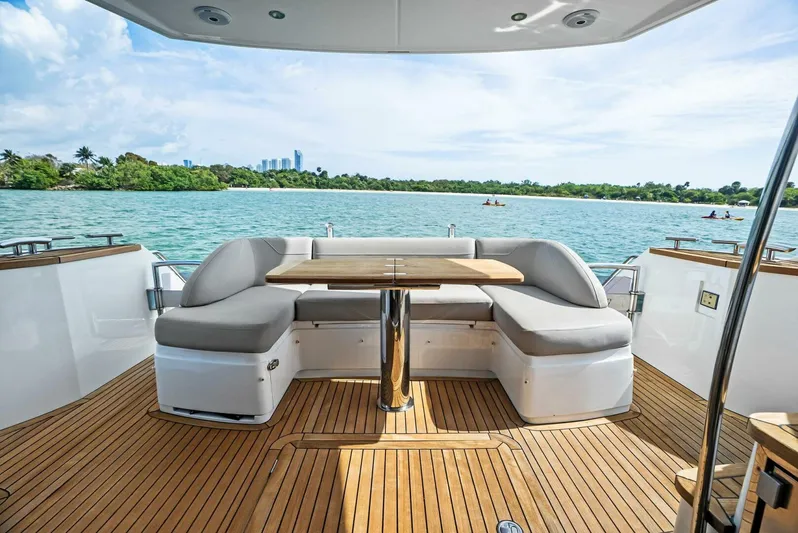 Zefa Yacht Photos Pics Luxury seating area on 2019 Princess 43 Flybridge yacht with scenic water view.