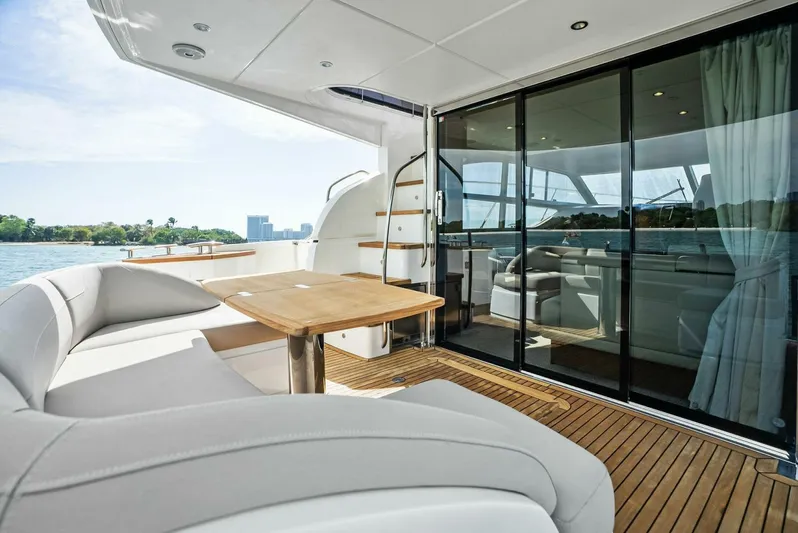 Zefa Yacht Photos Pics Luxurious 2019 Princess 43 Flybridge yacht with elegant seating and scenic ocean view.