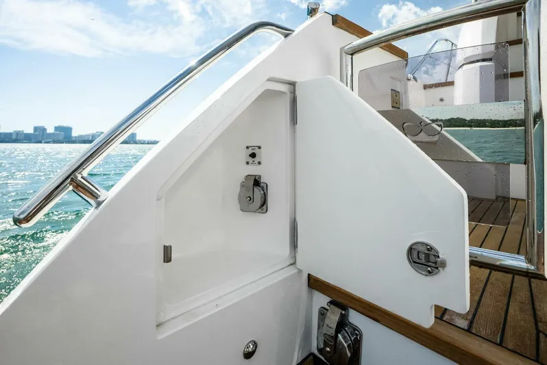 Zefa Yacht Photos Pics 2019 Princess 43 Flybridge yacht detail, open storage compartment, ocean view.