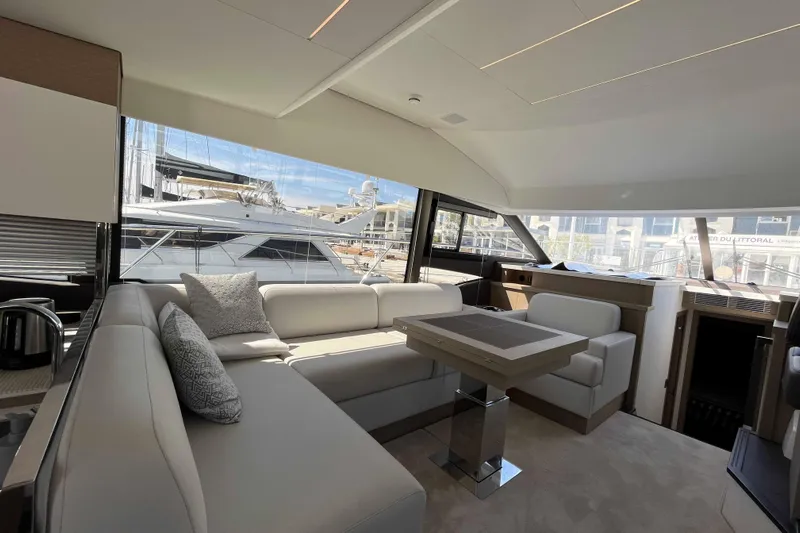  Yacht Photos Pics Luxurious interior of 2023 Prestige 520 yacht with elegant seating and modern design.
