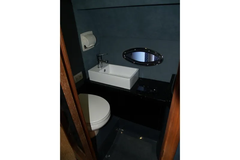 Speedbird Yacht Photos Pics Compact bathroom in 2012 Hunton XRS 43 yacht with sink and toilet.