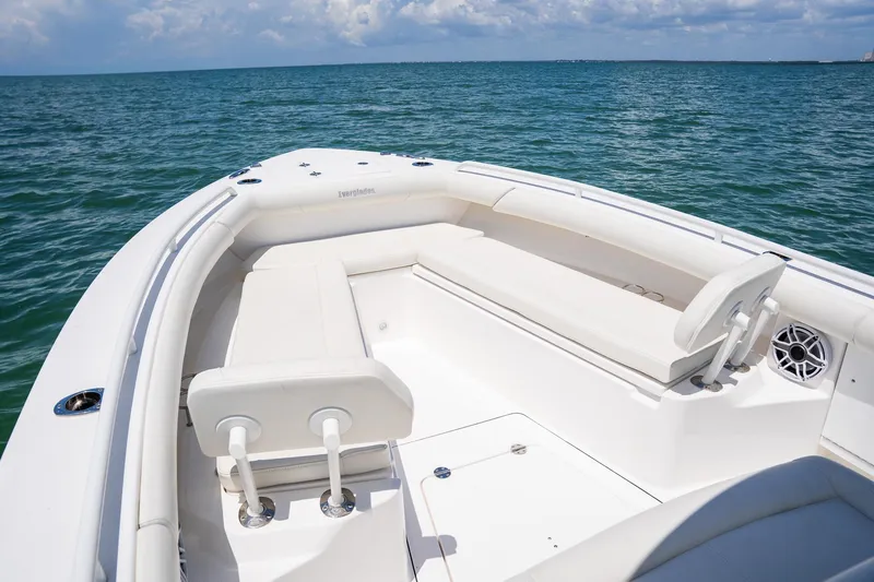  Yacht Photos Pics 2021 Everglades 273 Center Console boat on open water, featuring spacious seating.