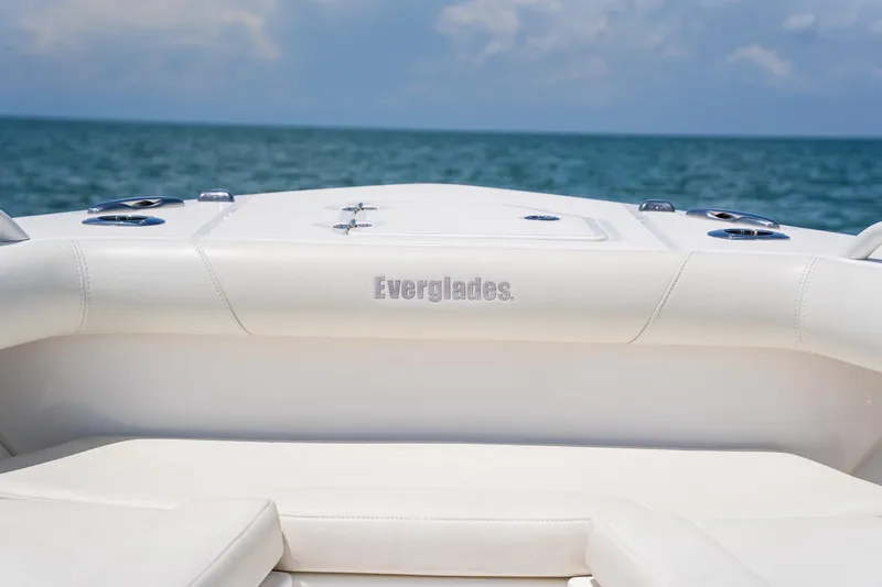  Yacht Photos Pics 2021 Everglades 273 Center Console boat, white seating, ocean view.
